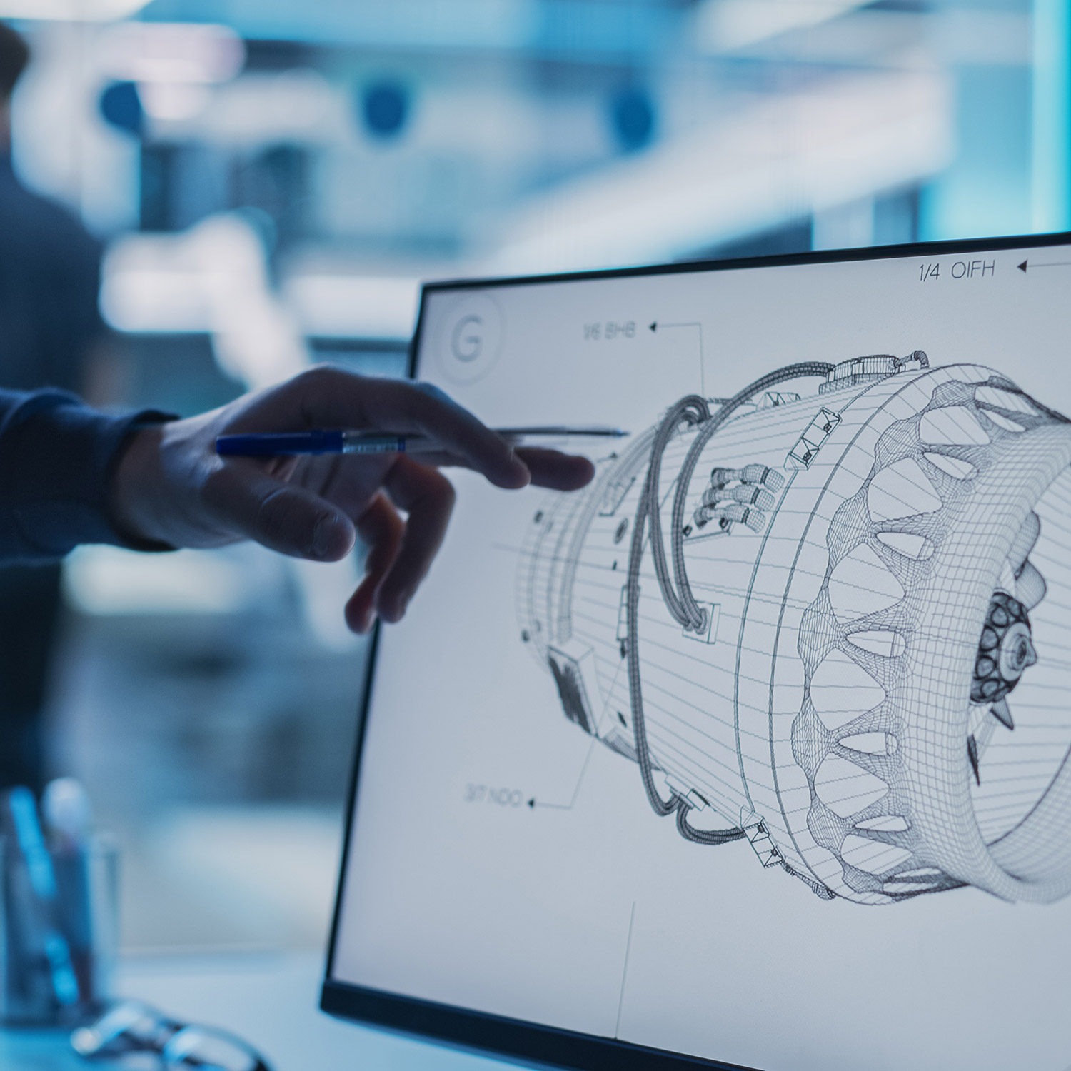 Engineer designing mechanical component with CAD